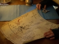 Thorin (Kahoko Himura) surveys the map to Erebor.